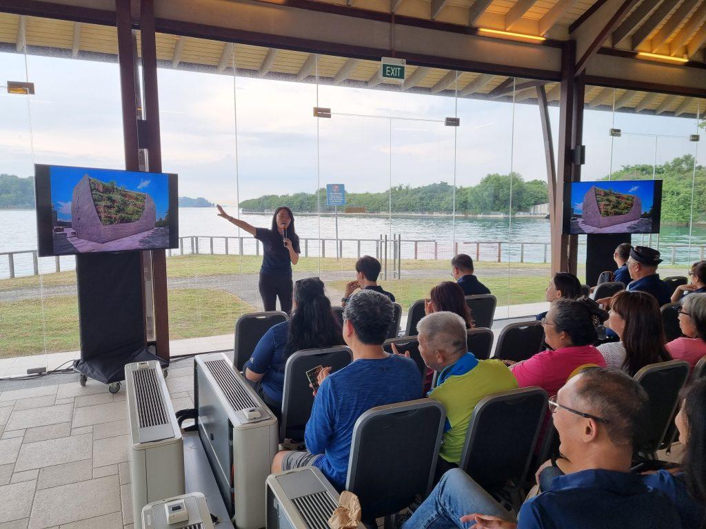 Participants engaged in a Museum talk conducted on-site at Lazarus Island.