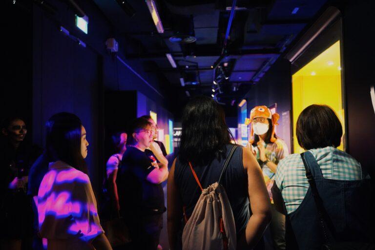 Participants listening attentively to our Education staff in the Body Snatchers exhibition. (Credit: Natalie Ong)