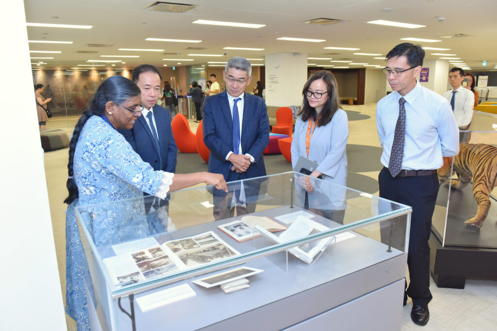 (Left to right) NUS Libraries’ Principal Librarian Ms Gandhimathy Durairaj, Prof Aaron Thean, HE Mr Ishikawa, Assoc Prof Natalie Pang and Assoc Prof Darren Yeo admiring the exhibits at the lobby of NUS Central Library. Photo courtesy of NUS Libraries.