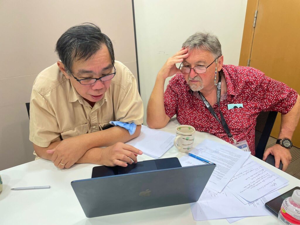 Prof Peter Ng (left) and Dr Peter Davie (right) working together during Dr Davie’s most recent visit to the Museum in November 2023. Photo credit: Jose Christopher Mendoza